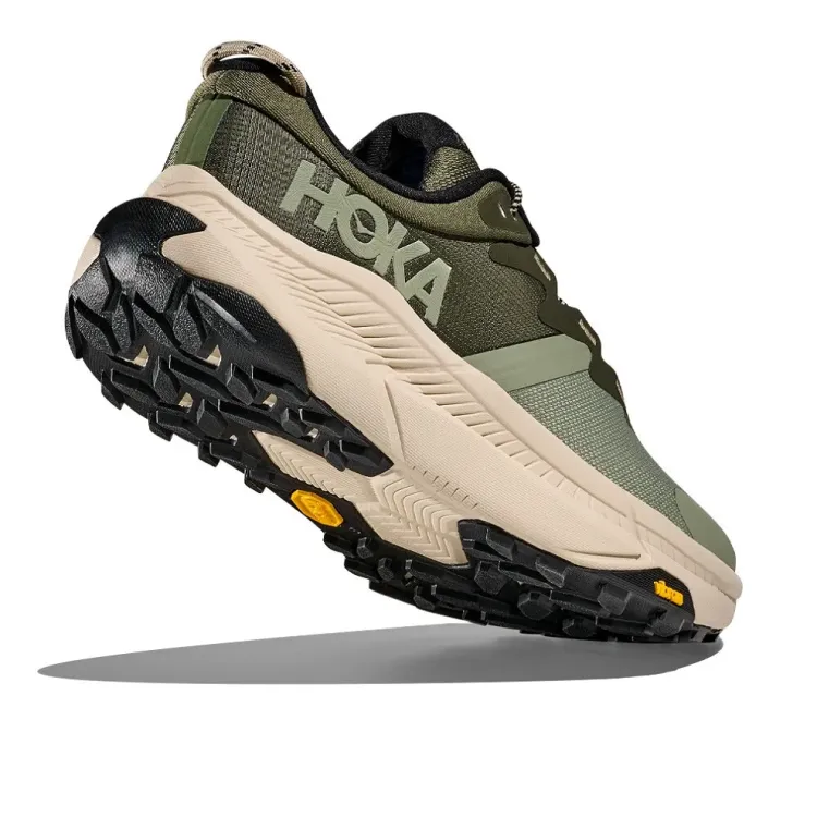 HOKA TRANSPORT SSSC ZAPATILLA TREKKING HOMBRE INCLINADA,ARISTARUN