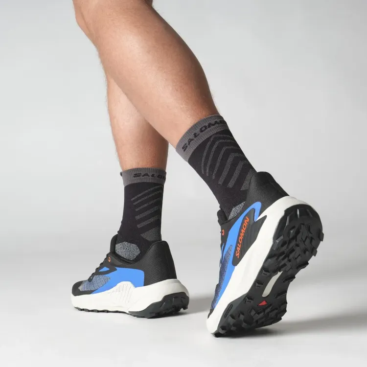 SALOMON GENESIS ZAPATILLA TRAIL HOMBRE BLACK/FRENCH BLUE DE PIE TRASERA, ARISTARUN