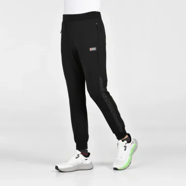 +8000 EYRIE NEGRO PANTALONES LARGOS DEPORTIVOS HOMBRE VISTA FRONTAL,ARISTARUN