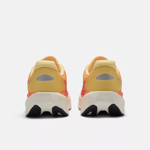 NEW BALANCE FUELCELL REBEL v5 ZAPATILLAS RUNNING ASFALTO HOMBRE NARANJA VISTA PAREJA TALÓN, ARISTARUN