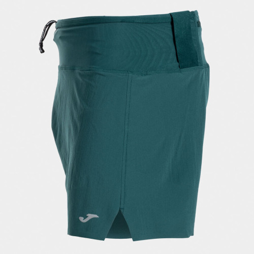 JOMA ICONIC SHORT TURQUESA PANTALONES TRAIL HOMBRE VISTA LATERAL, ARISTARUN