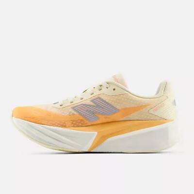 NEW BALANCE FUELCELL REBEL v5 NARANJA ZAPATILLAS RUNNING MUJER VISTA LATERAL EXTERNA, ARISTARUN 2