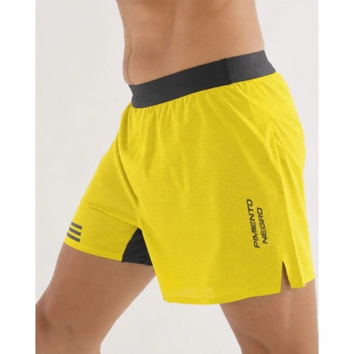 PIMIENTO NEGRO PANTALONES RUNNING AMARILLO UNISEX VISTA LATERAL, ARISTARUN